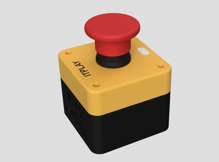 Acionador ITPLAY CAM: caixa amarela e preta com um botão vermelho grande